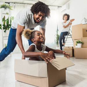 Happy family moving into new home